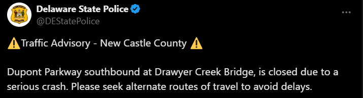 Traffic Advisory graphic stating "Traffic Advisory - New Castle County- Dupont Parkway southbound at Drawyer Creek Bridge, is closed due to a serious crash. Please seek alternate routes of travel to avoid delays."