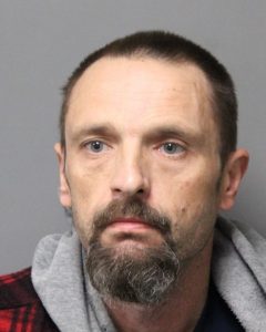 Jason Wilz mugshot photo with gray background