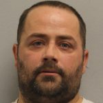 Brandon Myers mugshot photo on gray background