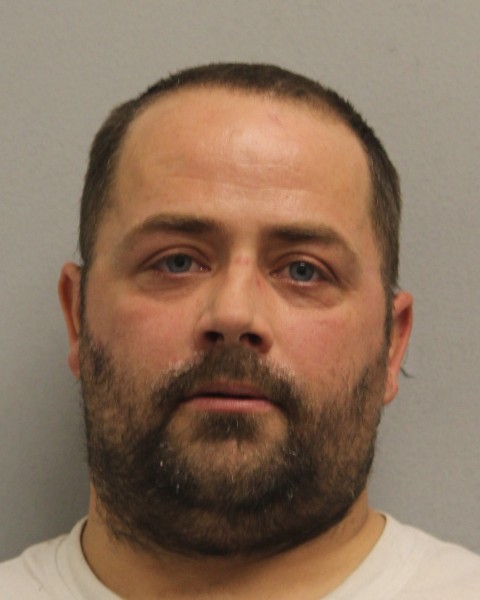 Brandon Myers mugshot photo on gray background