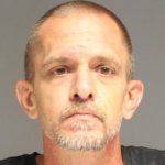 Andrew Kucharczyk mugshot photo with gray background