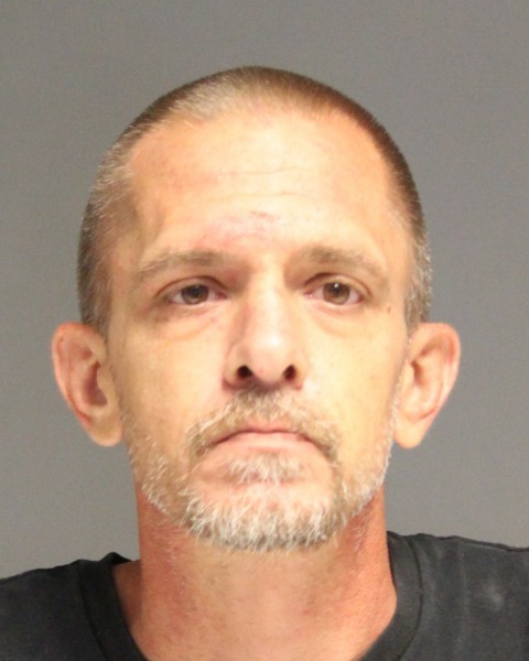 Andrew Kucharczyk mugshot photo with gray background