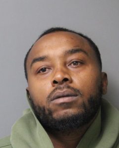 Djuan Sheppard mugshot photo with gray background