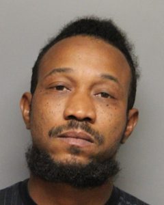 Paul Waller's mugshot photo with gray background